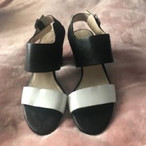 black and white leather high heals